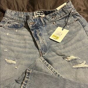 Distressed Light Blue Jeans